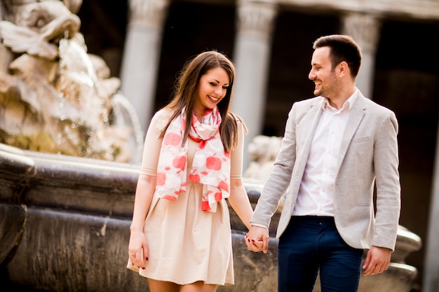 Loving couple sightseeing on travel vacation in Rome, Italy