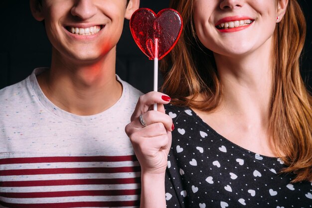 Loving couple smiling and sweet in the form of heart