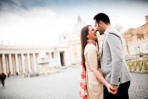 Loving couple at the St. Peter's Square in Vatican