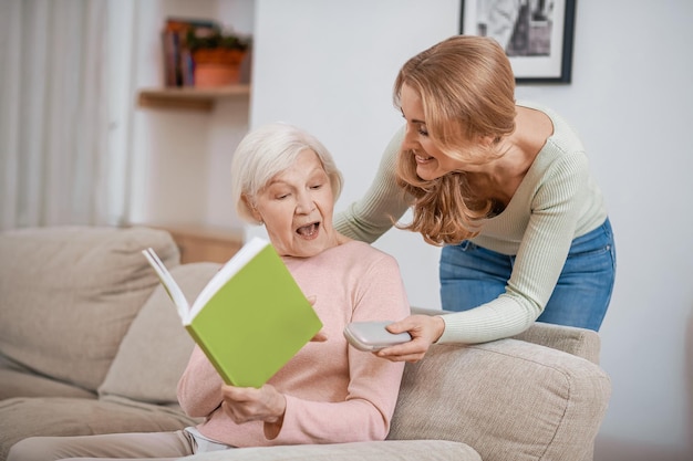 Loving daughter giving a present to her beloved mother