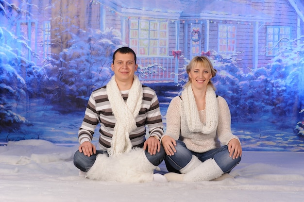 Loving man and woman celebrate Christmas together