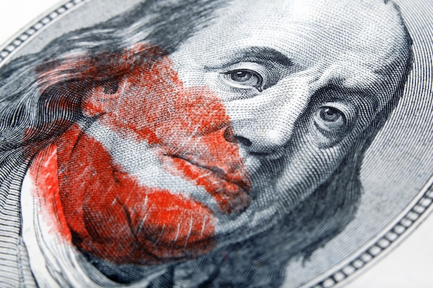 Loving money Greed kissed dollar