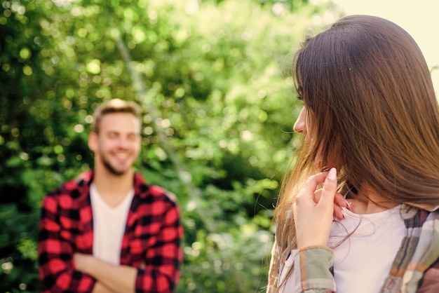 Loving people happy valentines day summer camping in forest family weekend romantic date girl in selective focus with man in park first meet of couple outdoor Relationship couple in love