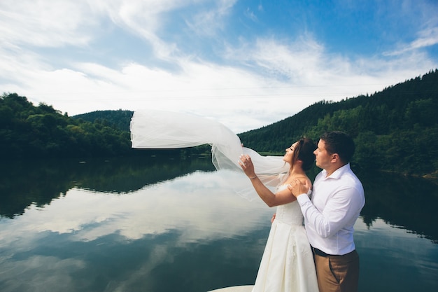 Photo loving wedding couple, man and woman