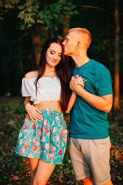 Loving young couple enjoying in nature