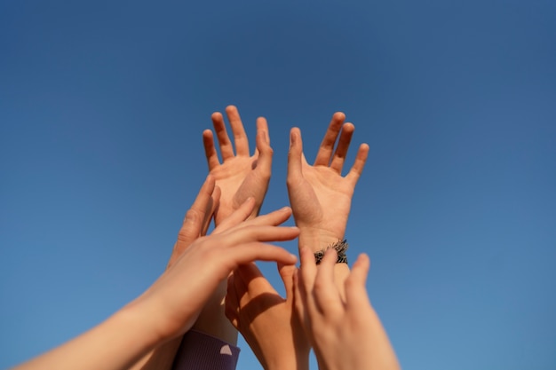 Low angle hand gestures representing friendship