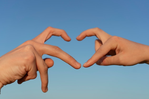 Low angle hand gestures representing friendship