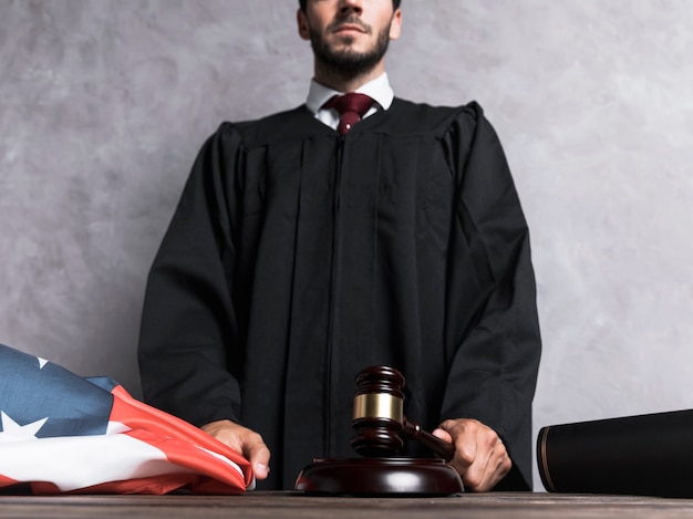 Low angle judge striking the gavel