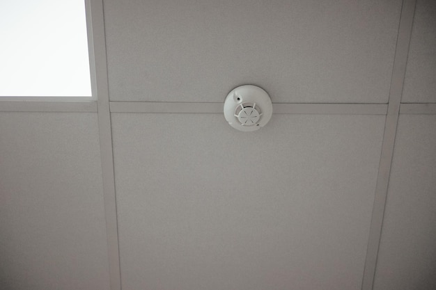 Low angle shot of an alarm on the ceiling