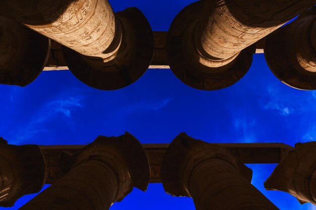 Low angle shot of the columns of the Temple of Karnak Egypt