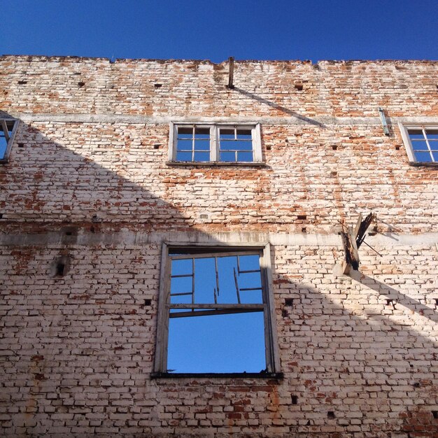 Low angle view of abandoned house