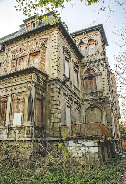 Low angle view of abandoned temple against sky