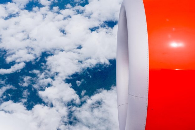 Low angle view of airplane flying against sky