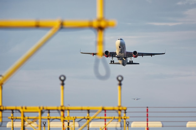 low angle view of airplane flying against sky