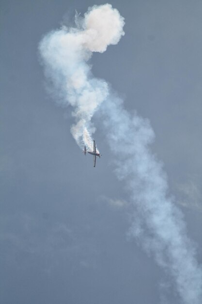 Low angle view of airplane flying in sky