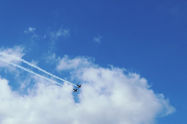 Low angle view of airplane flying in sky