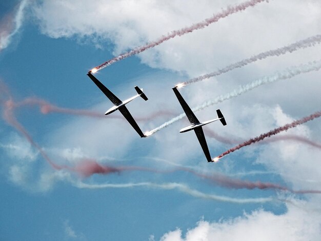 Low angle view of airplane flying in sky