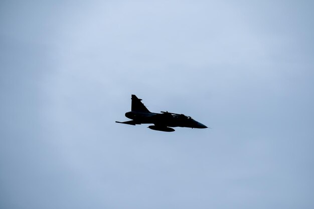 Low angle view of airplane flying in sky