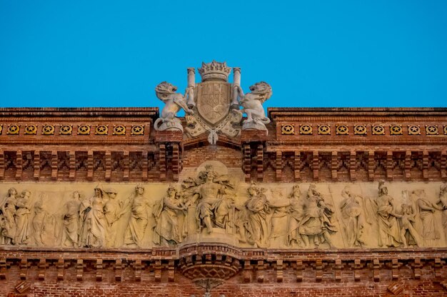 Low angle view of angel statue against clear sky