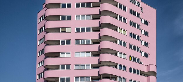 Low angle view of apartment building against sky