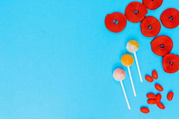 Low angle view of balloons against blue background