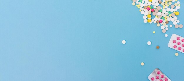 Low angle view of balloons against clear blue sky