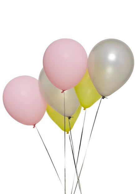 Low angle view of balloons against white background