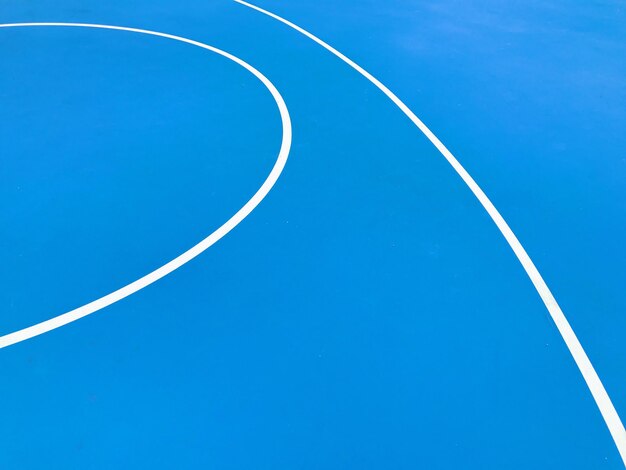 Low angle view of basketball hoop against clear blue sky