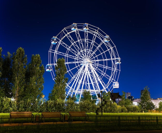 Low angle view of basketball hoop against sky at night