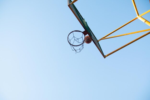 Low angle view of basketball hoop and ball