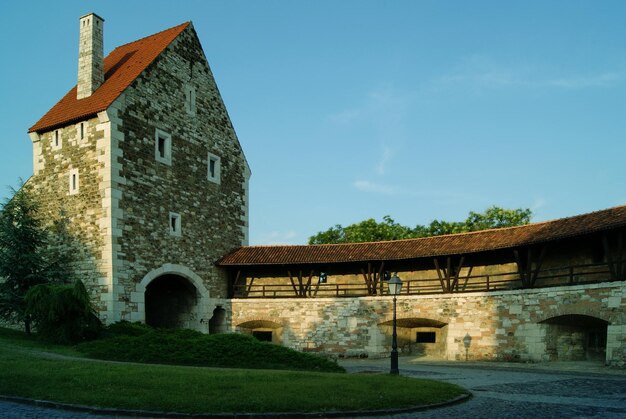 Low angle view of bell tower against sky