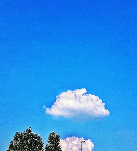 Low angle view of blue sky and clouds