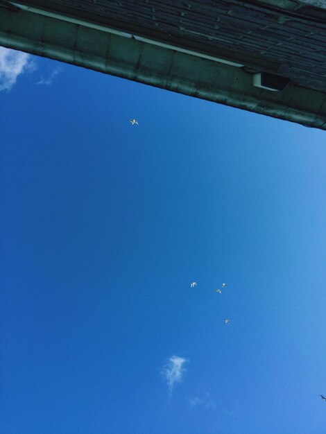 Low angle view of blue sky and clouds