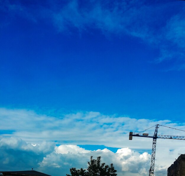 Low angle view of blue sky and clouds