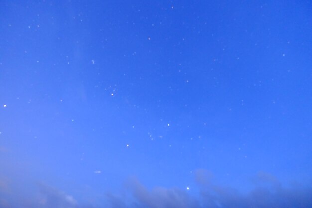 Low angle view of blue sky at night