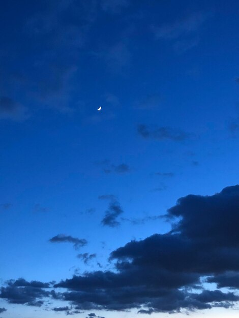 Low angle view of blue sky at night