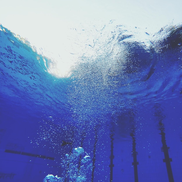 Low angle view of bubbles in sea