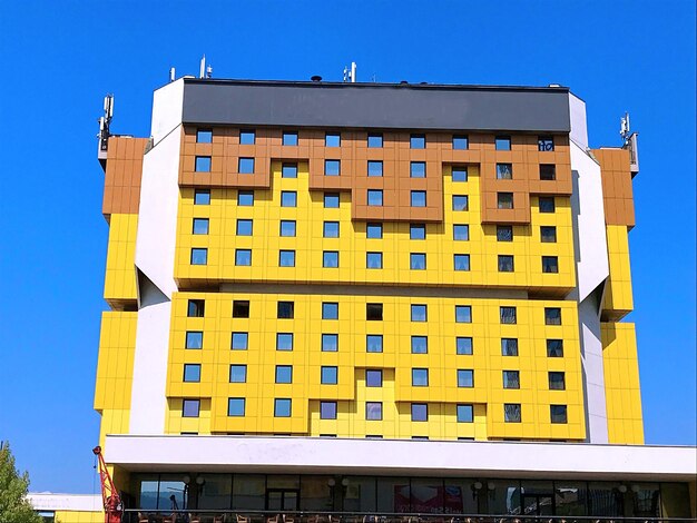 Low angle view of building against blue sky