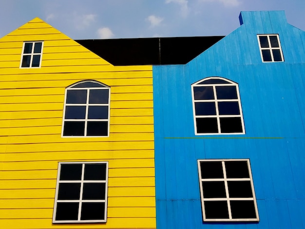 Low angle view of building against blue sky