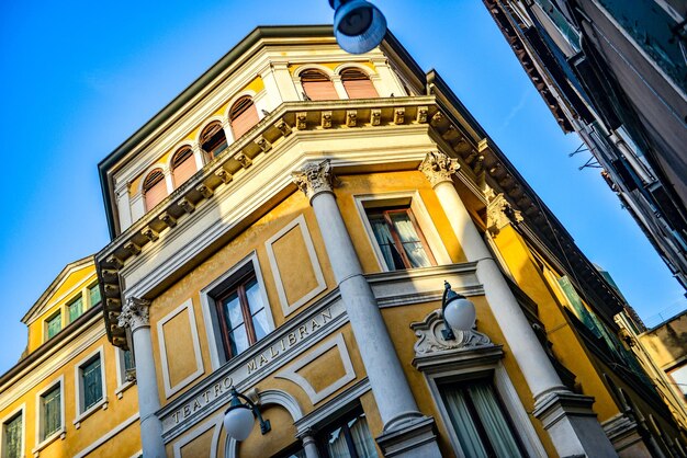 Low angle view of building against blue sky