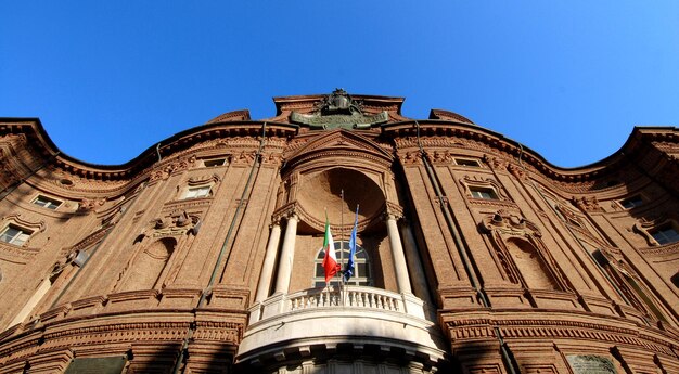 Low angle view of building against blue sky