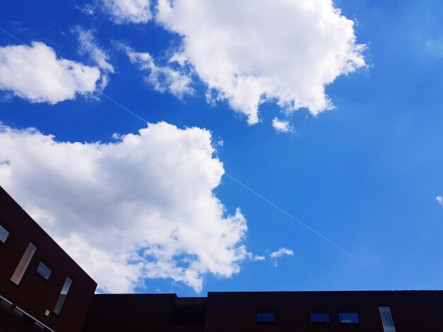 Low angle view of building against blue sky