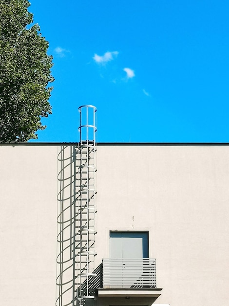 Low angle view of building against blue sky