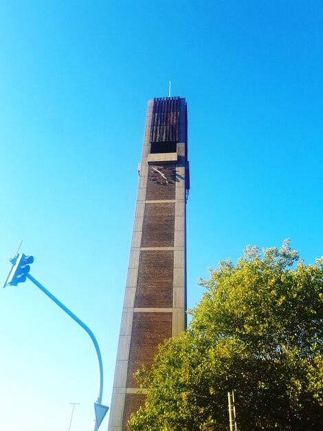 Low angle view of building against blue sky