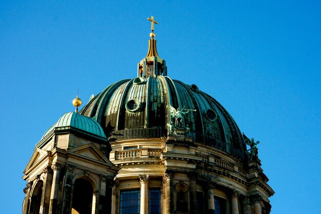 Low angle view of a building against blue sky