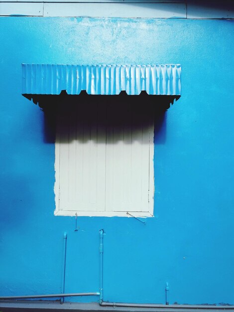 Low angle view of building against blue sky