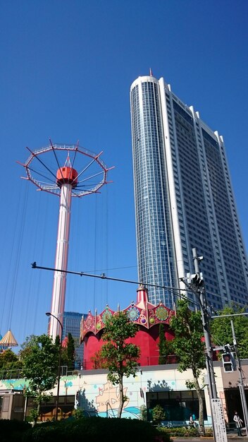 Low angle view of building against blue sky