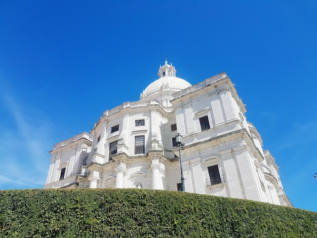 Low angle view of building against blue sky