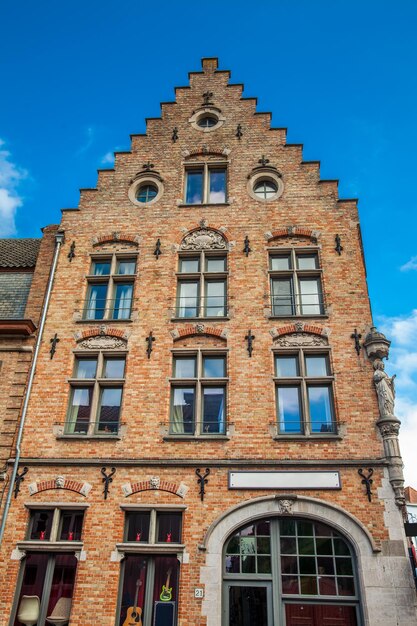 Low angle view of building against blue sky