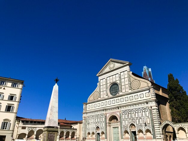 Low angle view of building against blue sky